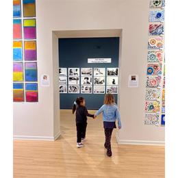 two students in art gallery